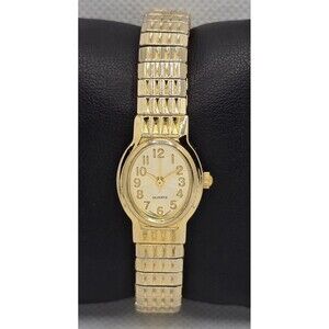 Women's Advance Quartz Oval Gold Tone Dial Case Expansion Band Watch 04